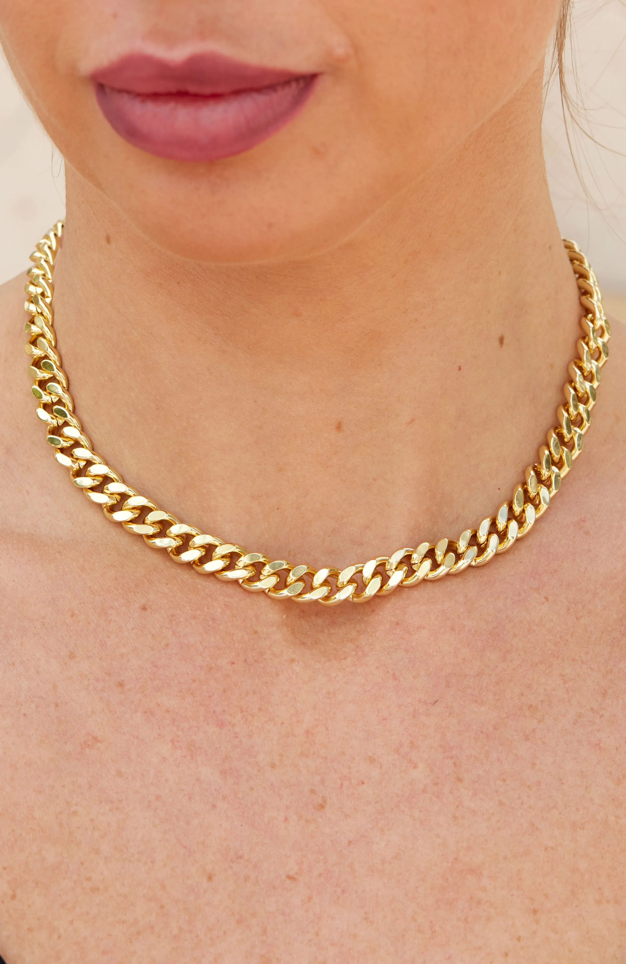 18K GOLD PLATED CUBAN LINK NECKLACE  WITH A CZ CLASP ACCENT