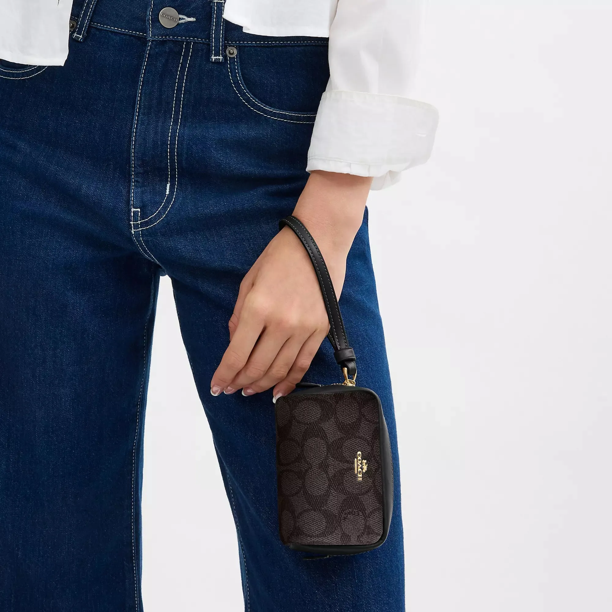 Coach Outlet Pouch Wristlet In Signature Canvas