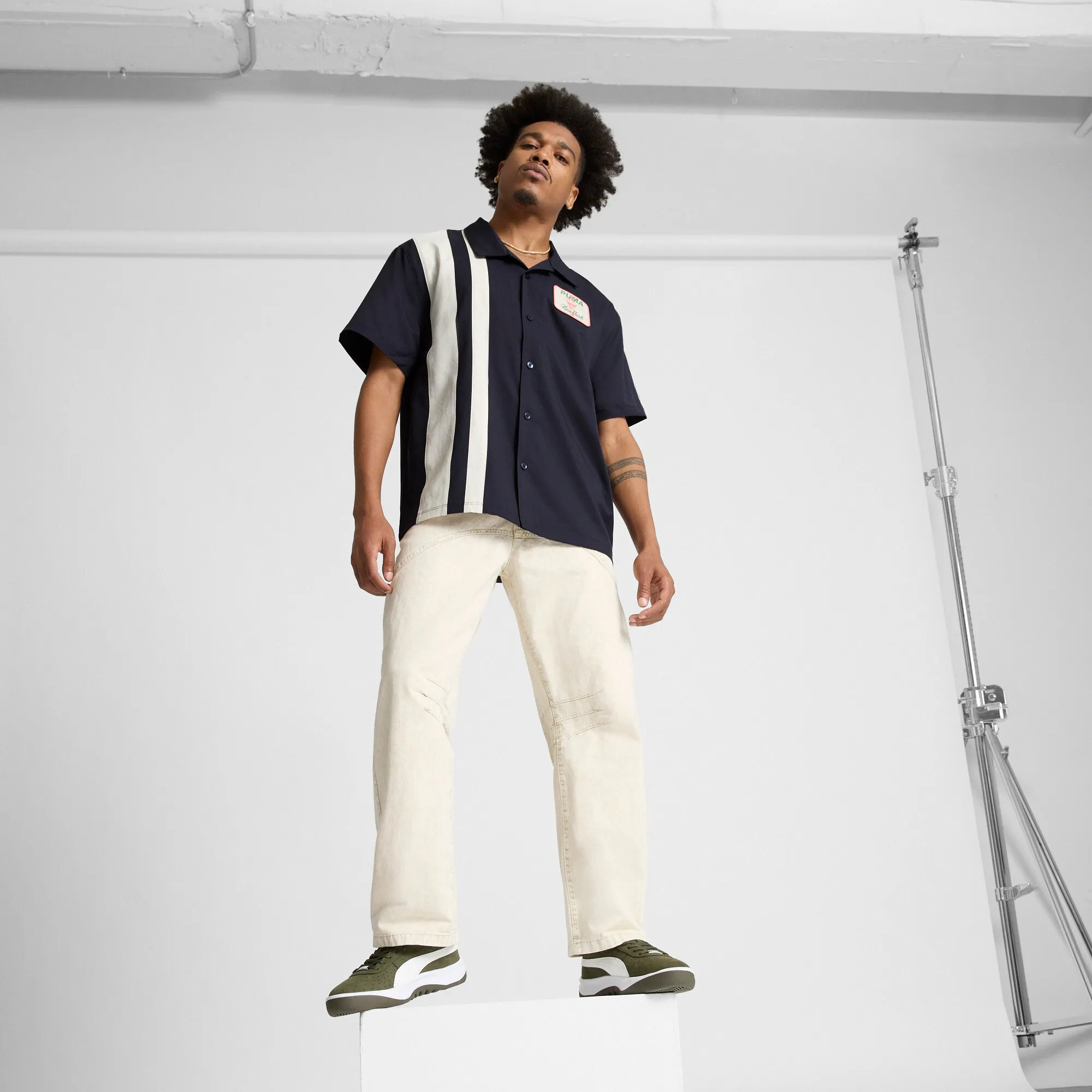 PUMA Men's Wardrobe Essentials Bright Lights NYC Flagship Relaxed Tee